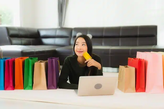 Portrait beautiful young asian woman with shopping bag credit card